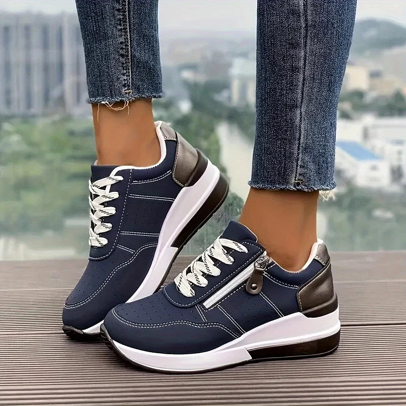 Avalance Women's Trainers featuring an elevated sole and breathable design, perfect for comfortable walking and stylish athletic wear. 1