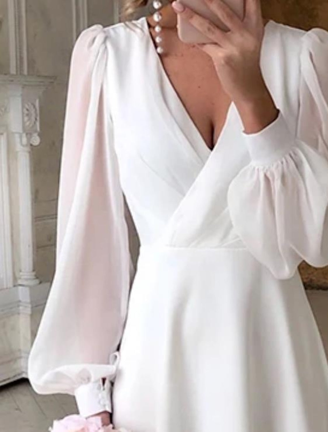 Breezy Women's Wedding Dress with Classic Long Sleeves and Flowing Silhouette 1