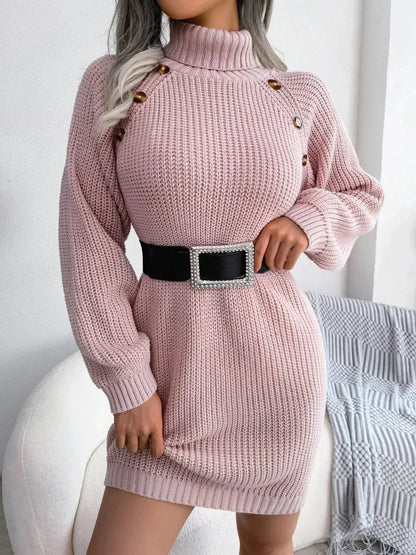 Chara Women’s Sweater Dress featuring a cozy chunky knit design and stylish shoulder button detail, perfect for a chic and comfortable winter outfit. 1