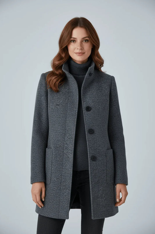 Chic women's overcoat featuring a tailored fit and classic length, perfect for stylish layering in cooler weather. 0