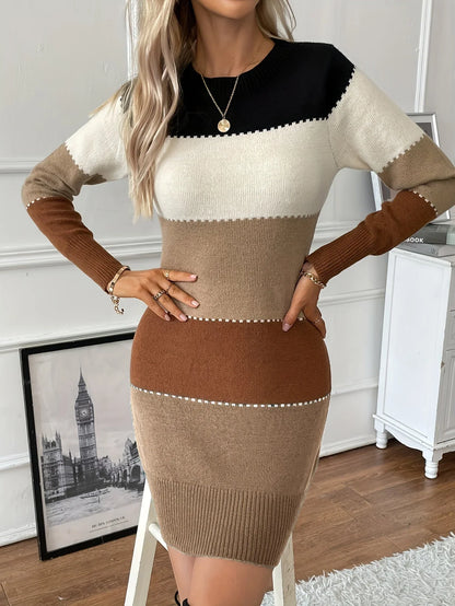 Cora Women’s Sweater Dress featuring a stylish colour block design and contrast stitch detail, perfect for a chic and cozy look. 1
