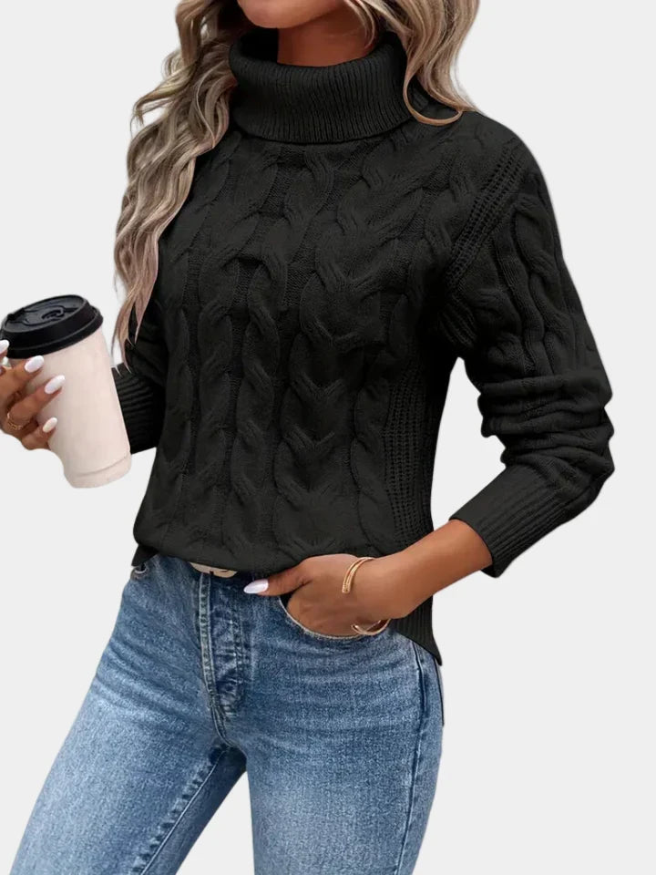 Cora Women’s Sweater featuring a stylish cable knit design and a cozy high turtleneck collar, perfect for fall and winter layering. 4