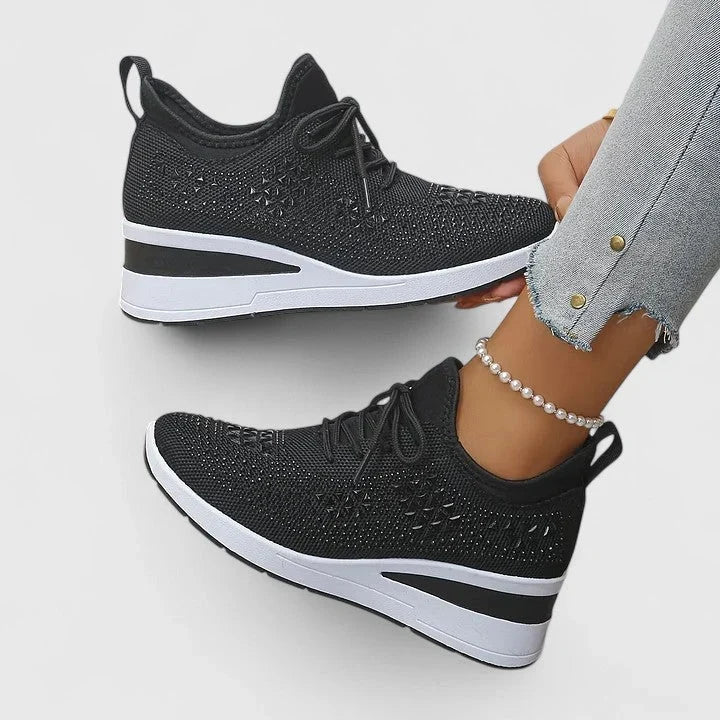 Danivira Orthopaedic Shoes featuring supportive heel elevation and a breathable mesh upper for enhanced comfort and foot health. 0