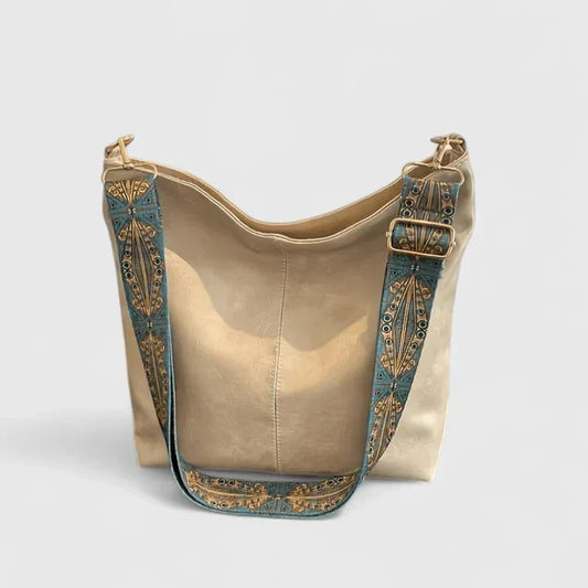Elyza Women’s Handbag featuring a spacious interior, stylish design, and comfortable wide shoulder strap for everyday use. 0
