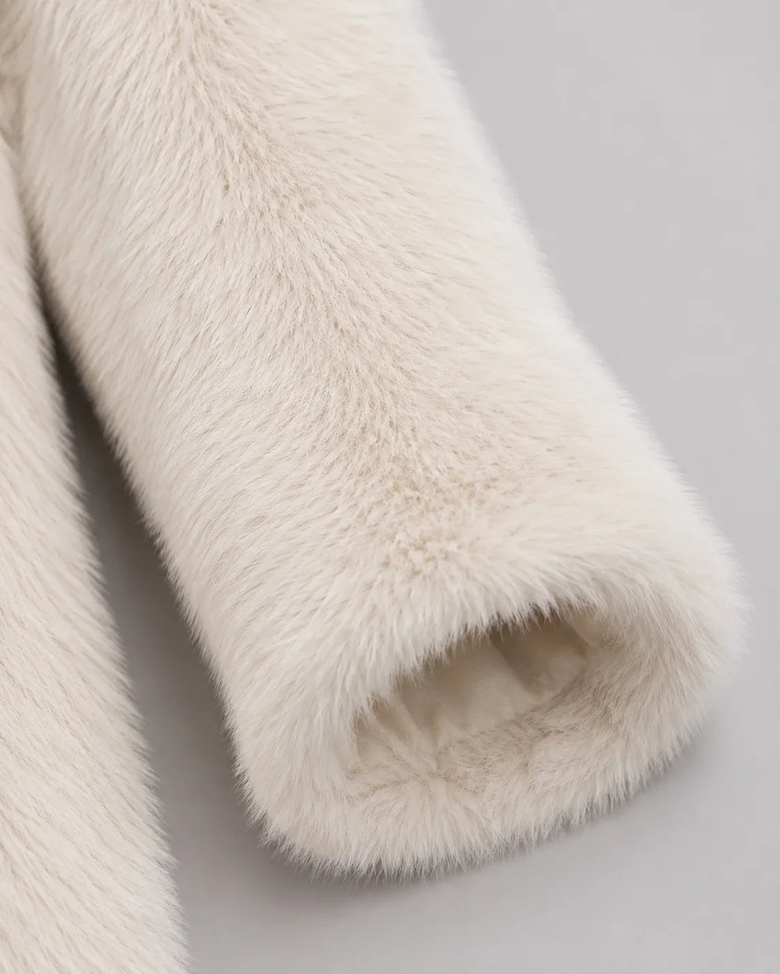 Fiona Women's Faux Fur Coat featuring a luxurious plush shawl collar and stylish mid-thigh length, perfect for keeping warm and fashionable in colder weather. 5