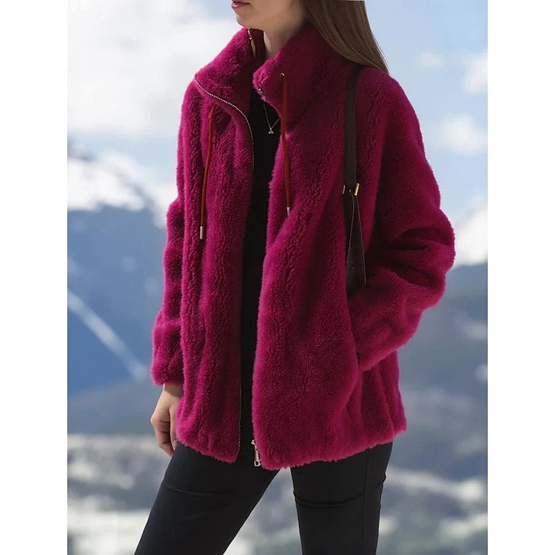 Freya Women's Coat featuring a stylish zip-up design and stand collar, perfect for everyday warmth and fashion. 1
