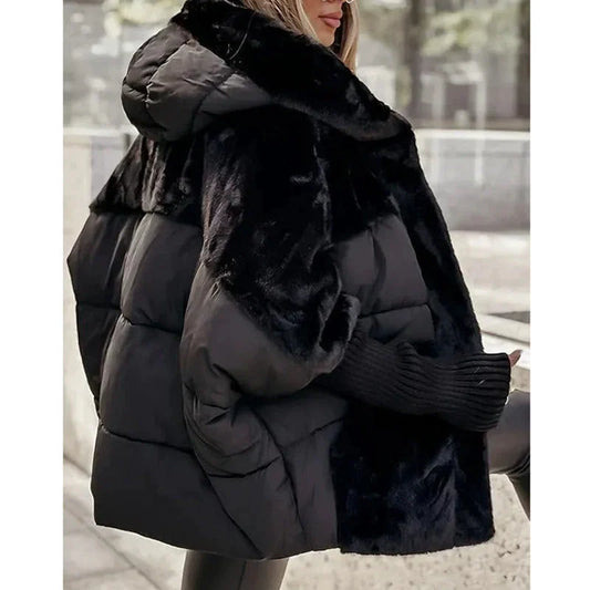 Kaileigh Women's jacket featuring stylish faux fur details and a protective hood, perfect for cold weather and outdoor activities. 0