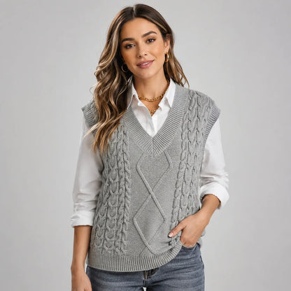 Mira Women’s Sweater Vest featuring a ribbed knit V-neck design and a stylish sleeveless cut, perfect for layering in any season. 0