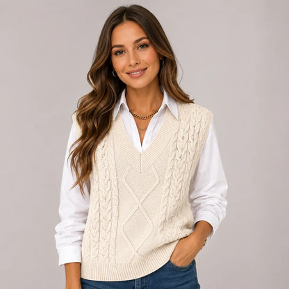 Mira Women’s Sweater Vest featuring a ribbed knit V-neck design and a stylish sleeveless cut, perfect for layering in any season. 1
