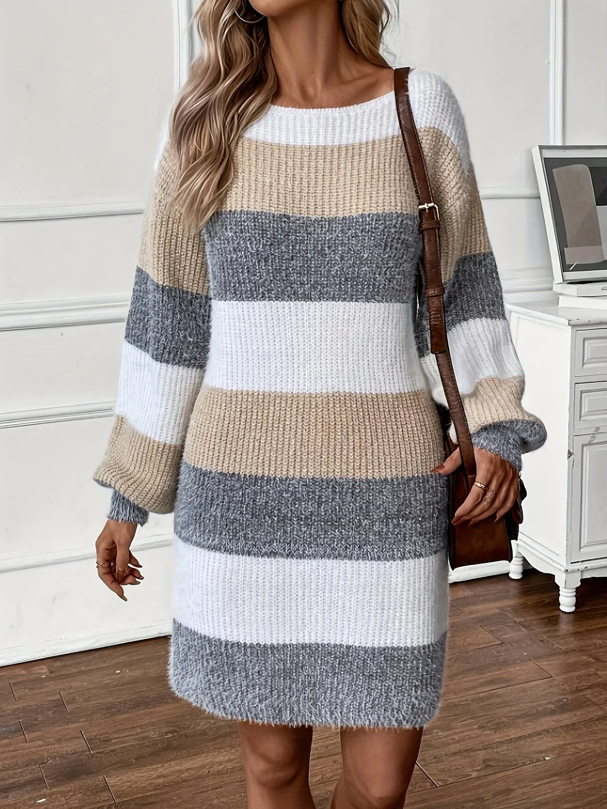 Olina women's sweater dress featuring an oversized fit and puff sleeves, designed with a bold colour block pattern for a stylish and contemporary look. 3