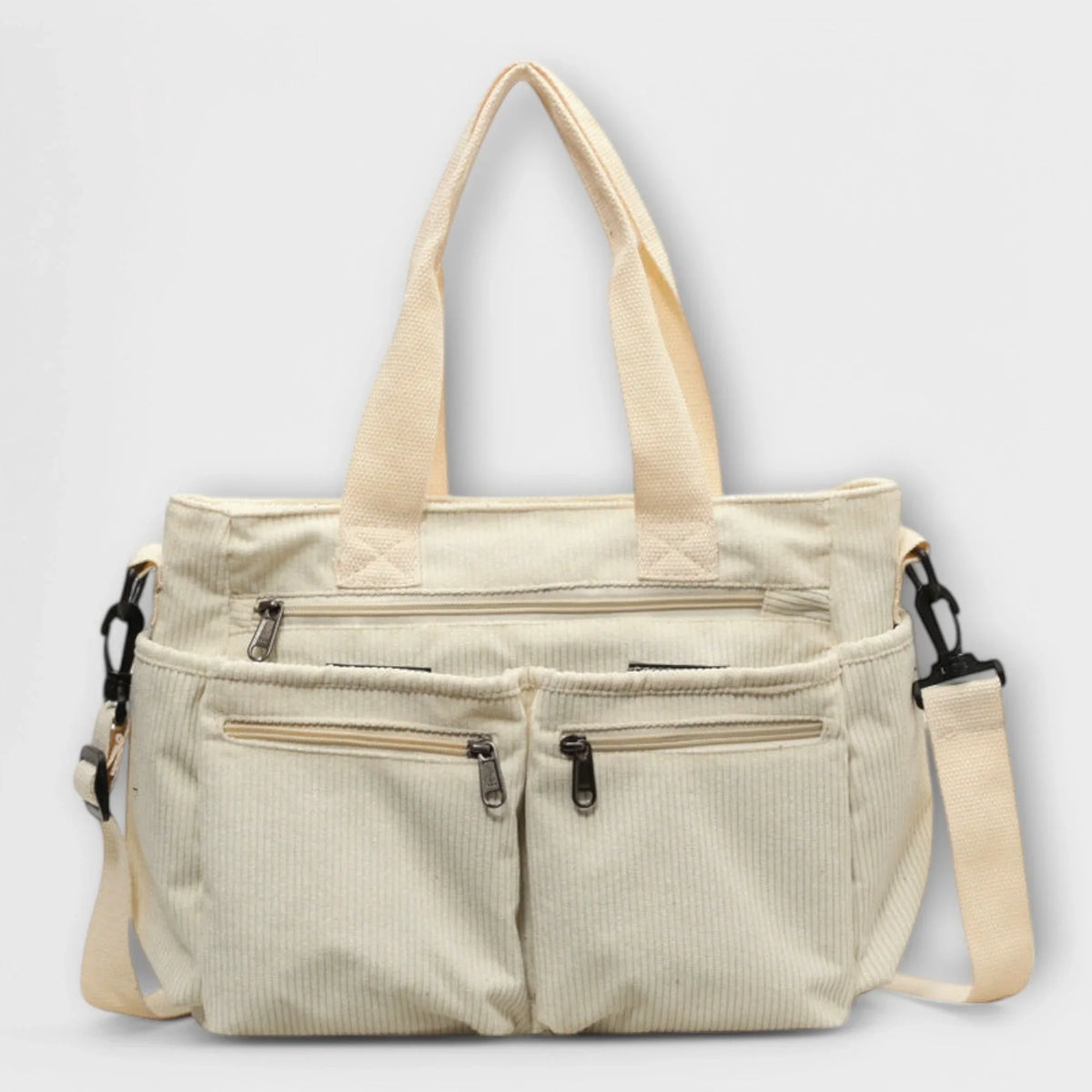 Olivia Tote Bag featuring a spacious interior and a secure zipper closure, perfect for everyday use and stylish storage. 0