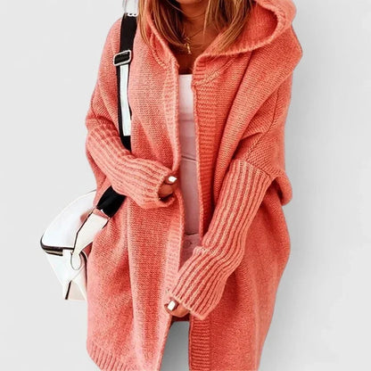 Rosalynne Women’s oversized cardigan featuring a large hood, perfect for cozy comfort and stylish layering in any season. 1