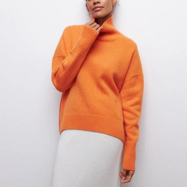 Serene Women’s Oversized Sweater featuring a stylish turtleneck collar and ribbed details, perfect for cozy and fashionable layering in cool weather. 1