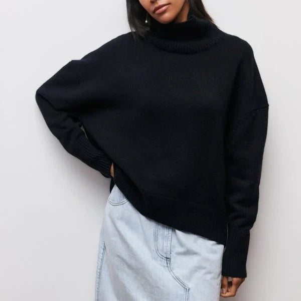 Serene Women’s Oversized Sweater featuring a stylish turtleneck collar and ribbed details, perfect for cozy and fashionable layering in cool weather. 6