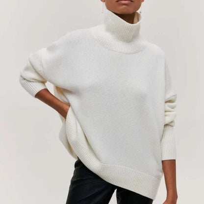 Serene Women’s Oversized Sweater featuring a stylish turtleneck collar and ribbed details, perfect for cozy and fashionable layering in cool weather. 7