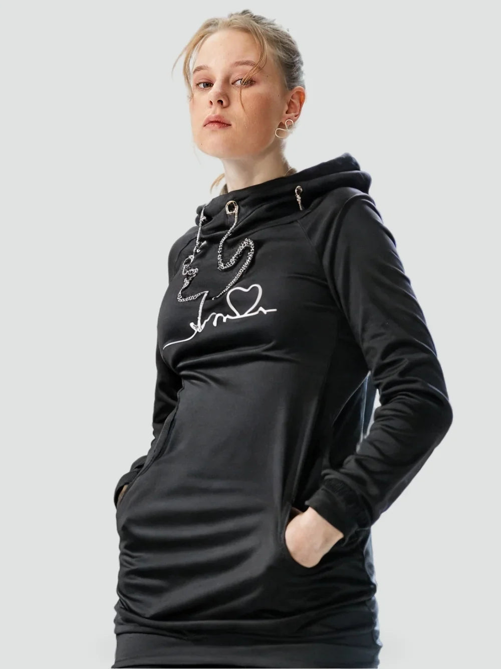 Sora Women’s Sweater Dress featuring a cozy hood, convenient side pockets, and stylish striped lining, perfect for casual outings and layered looks. 1