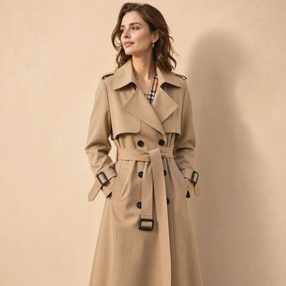 Tessa Women’s Trench Coat featuring a stylish double-breasted front and a belted waist, perfect for a chic and sophisticated look in any 1