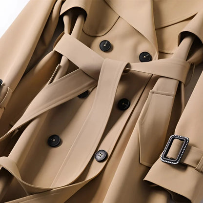 Tessa Women’s Trench Coat featuring a stylish double-breasted front and a belted waist, perfect for a chic and sophisticated look in any 4