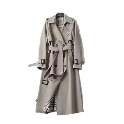 Tessa Women’s Trench Coat featuring a stylish double-breasted front and a belted waist, perfect for a chic and sophisticated look in any 9