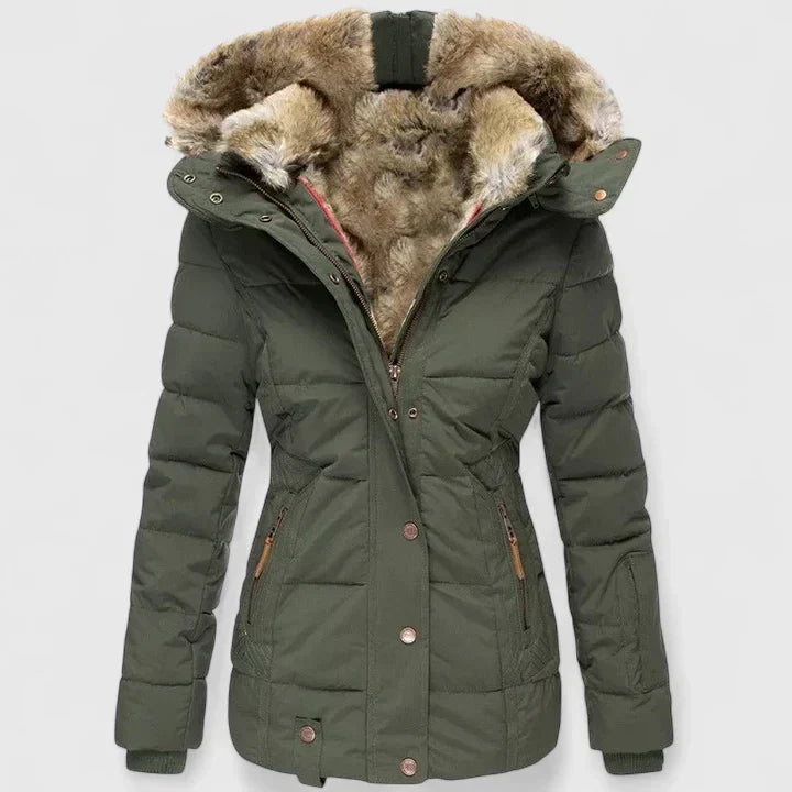 Vela Women’s Coat featuring an adjustable hood and practical pockets, perfect for stylish warmth and functionality in cooler weather. 1