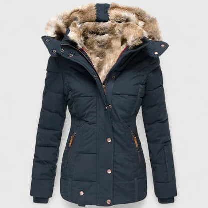 Vela Women’s Coat featuring an adjustable hood and practical pockets, perfect for stylish warmth and functionality in cooler weather. 4