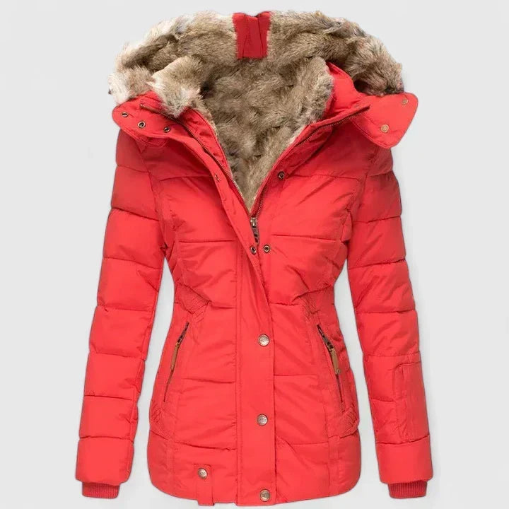 Vela Women’s Coat featuring an adjustable hood and practical pockets, perfect for stylish warmth and functionality in cooler weather. 5