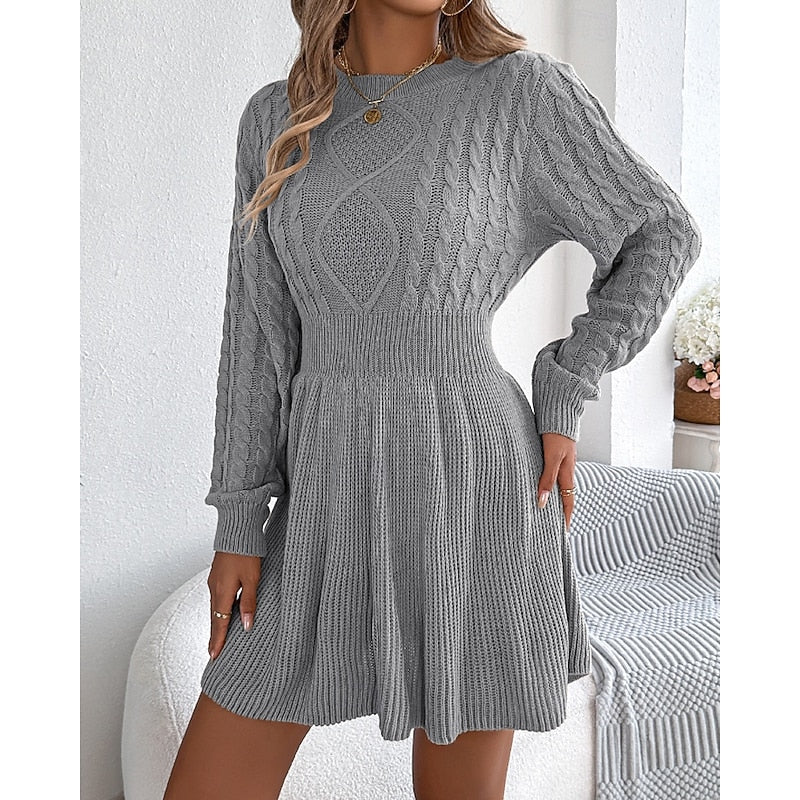 Whitney Women’s Sweater Dress featuring a stylish cable-knit texture and a fitted waist, perfect for a chic and cozy look in any season. 1