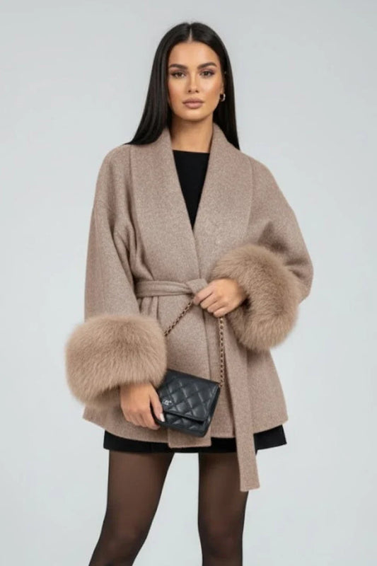 Willa Women's full-length coat featuring a stylish waist tie and elegant faux fur cuffs, perfect for winter fashion and warmth. 0