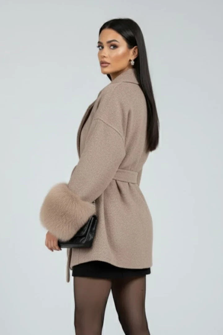 Willa Women's full-length coat featuring a stylish waist tie and elegant faux fur cuffs, perfect for winter fashion and warmth. 5