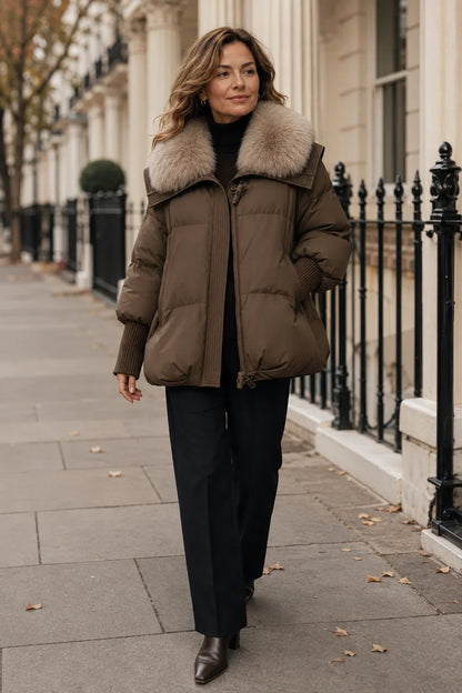 Willa Women’s Short Puffer Jacket featuring a stylish faux fur collar, perfect for keeping warm and chic during colder seasons. 2