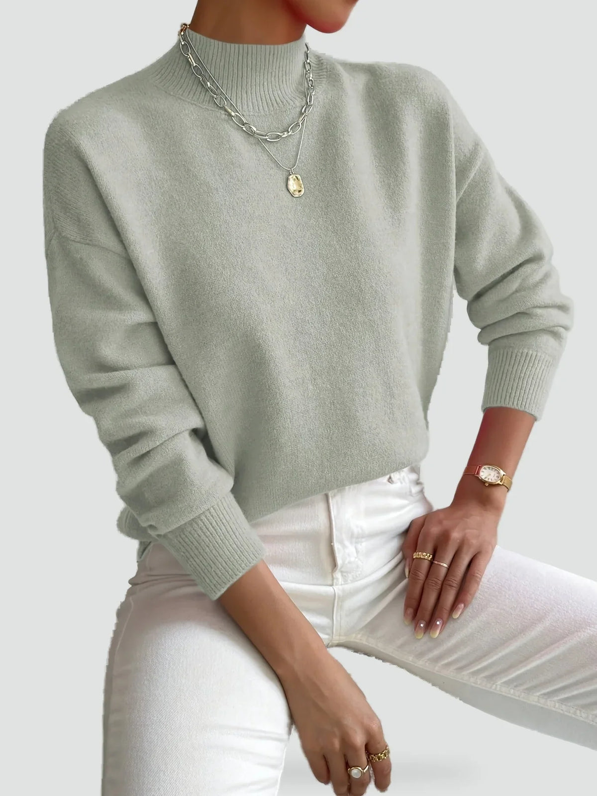 Willa Women’s Sweater featuring an elegant turtleneck and soft knit design, perfect for stylish and cozy winter outfits. 0