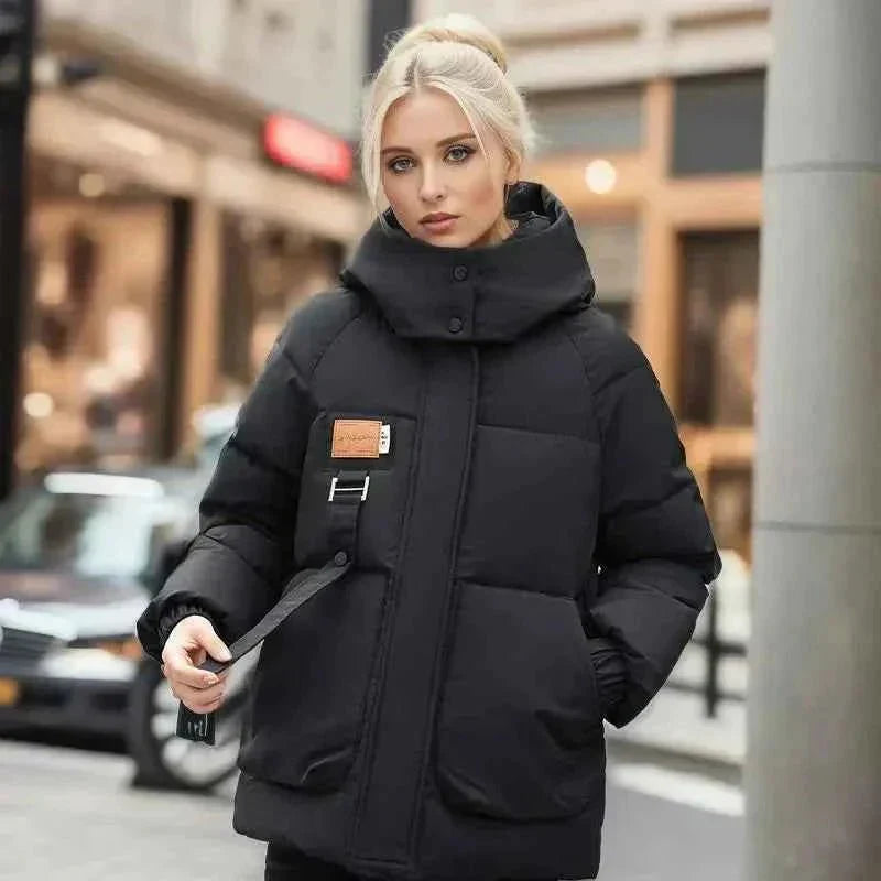 Wren Women's Winter Coat featuring a stylish funnel neck and padded insulation for warmth and comfort during cold weather. 0