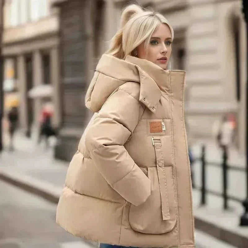 Wren Women's Winter Coat featuring a stylish funnel neck and padded insulation for warmth and comfort during cold weather. 3