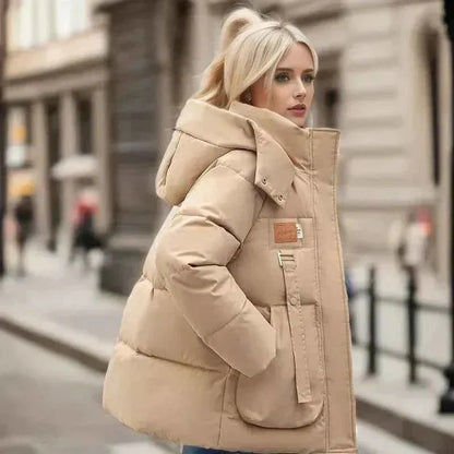 Wren Women's Winter Coat featuring a stylish funnel neck and padded insulation for warmth and comfort during cold weather. 3